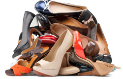 Pile of various female shoes, with clipping path