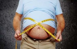 Fat belly. Man with overweight abdomen. Weight loss concept.